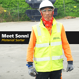 Purpose Fill Material Sorter Sonni with protective gear on