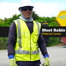 Purpose Fill Material Sorter Robin with saftey gear on